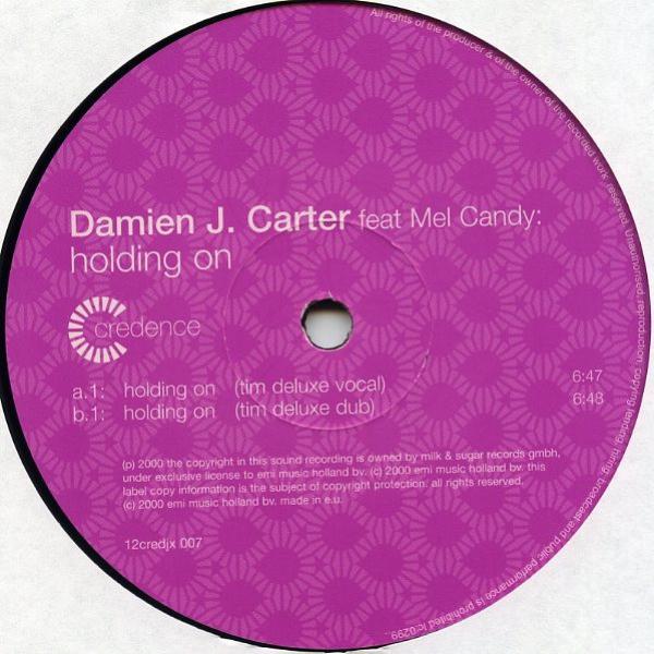 Damien J. Carter - Holding On